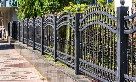 houses with metal fences around them|metal fence styles.